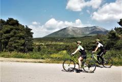 Couple cycling in Evia Island 